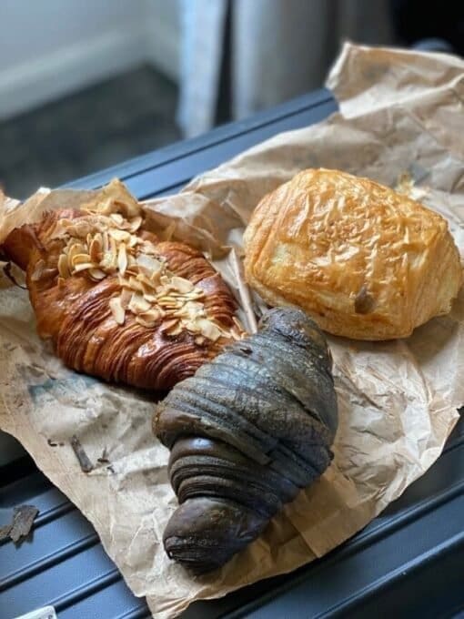 The ultimate guide to find the best croissants in Paris 33 An almond croissant, a chocolate croissant, and a pain au chocolat/https://maps.app.goo.gl/tZ6ryWTdrnMwYU8UA